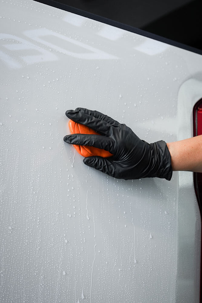 Americana Global Clay Bar removing contaminants from automotive paint