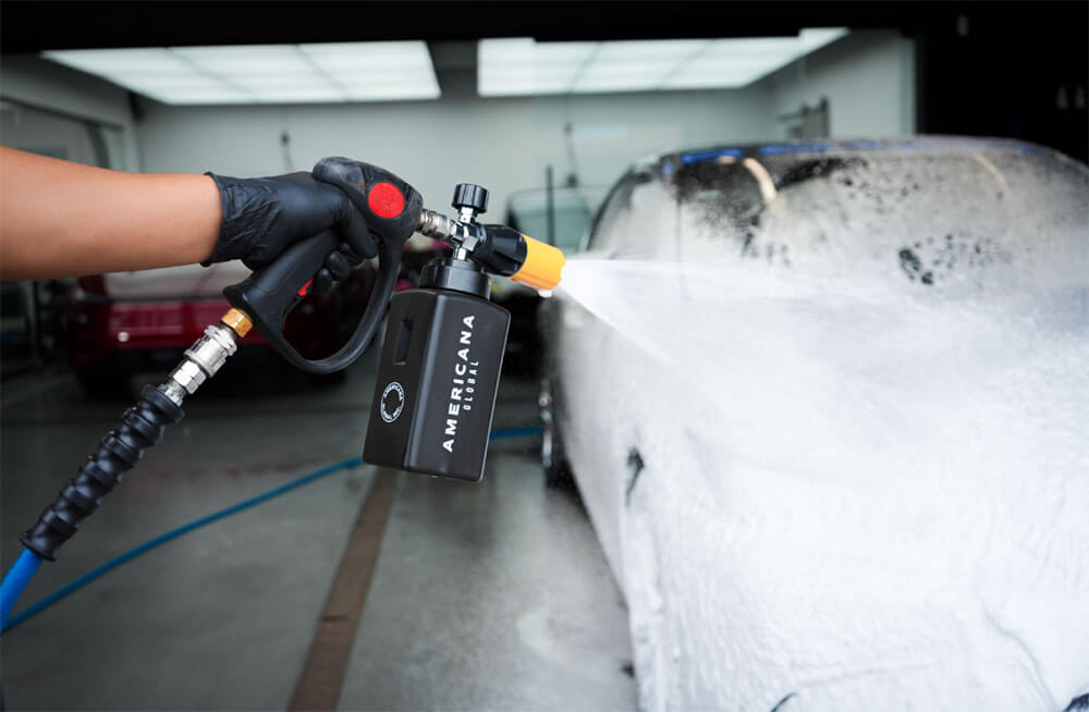 Americana Global Foam Cannon applying thick foam during a car wash